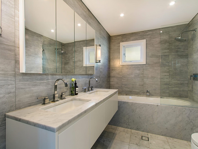 Bathroom With White Cabinets